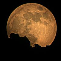 Full moon over mountains