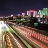 Interstate 80 at night with downtown Reno in background